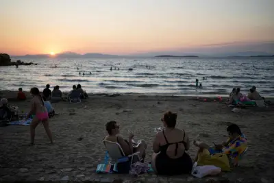 Beach on a budget: Greeks settle for day trips, priced out of iconic destinations
